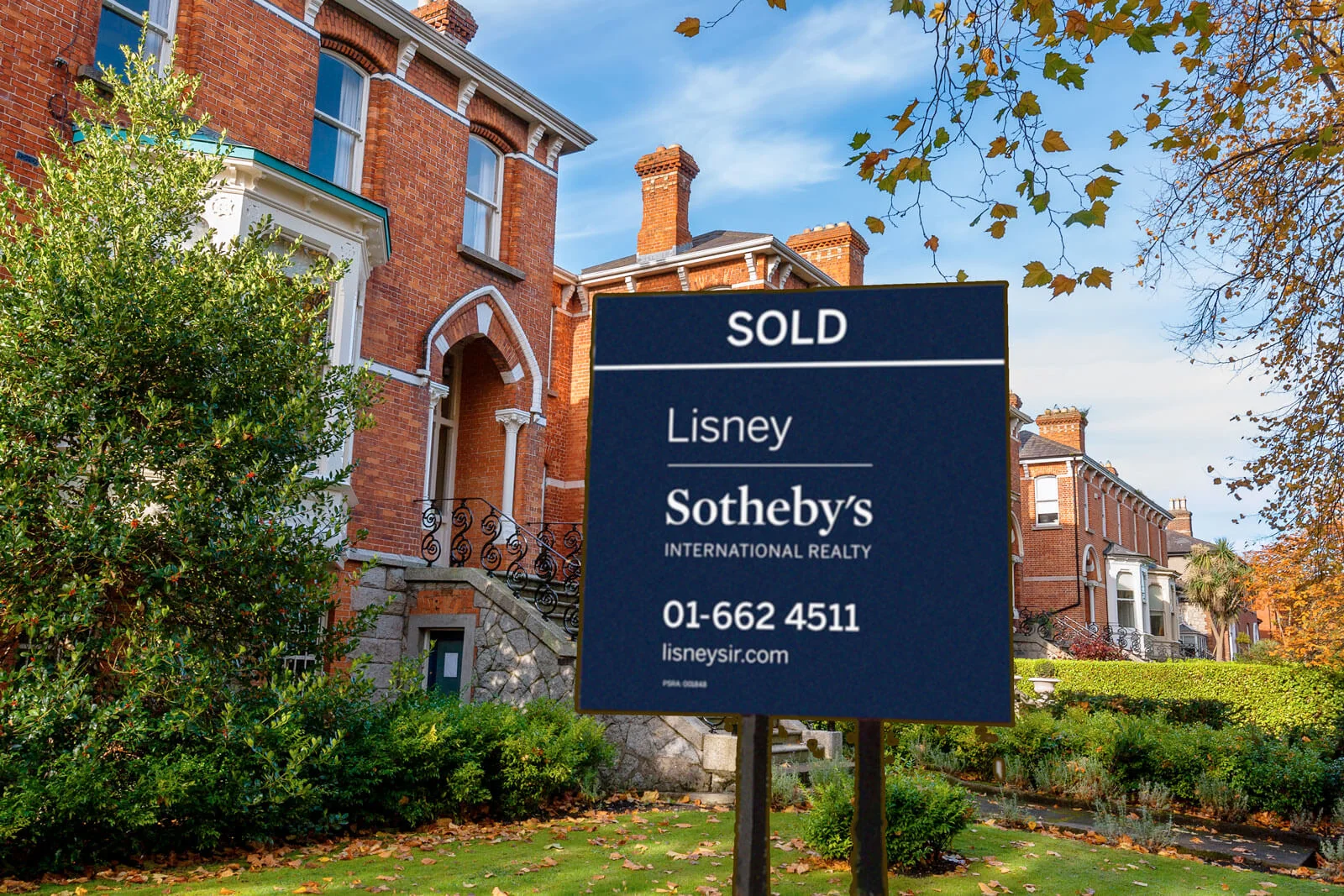 Dublin redbrick houses with a Sold sign outside
